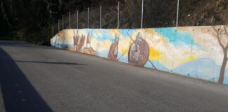 Графити с тема „Средновековни битки” върху новопостроената стена по пътя за Асеновата крепост