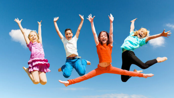 Happy children jumping